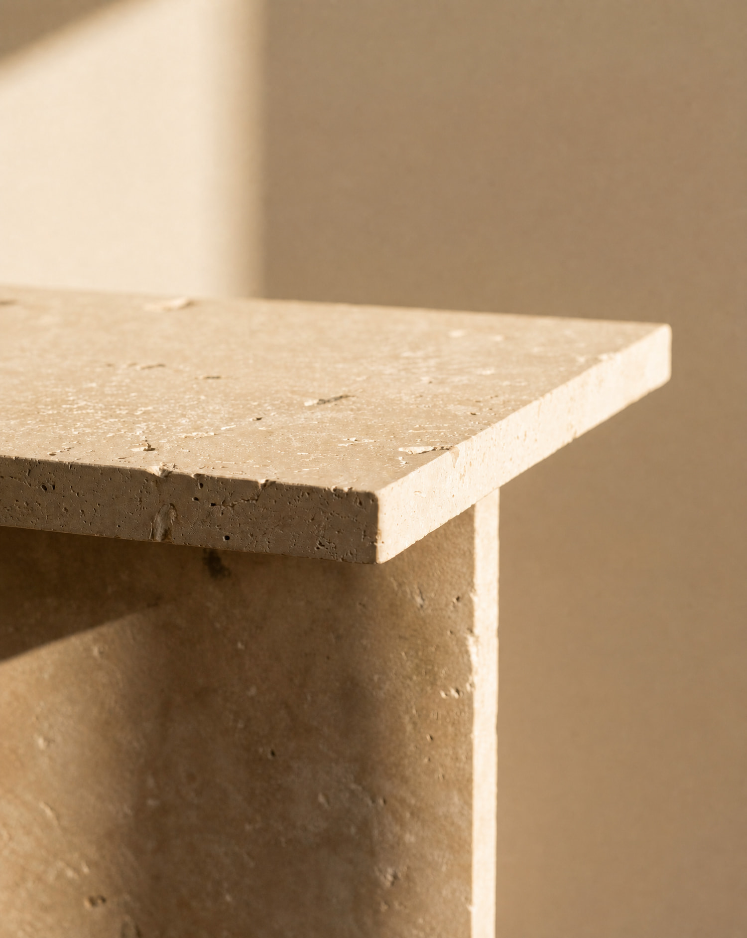 Natural travertine texture detail for a handmade travertine table