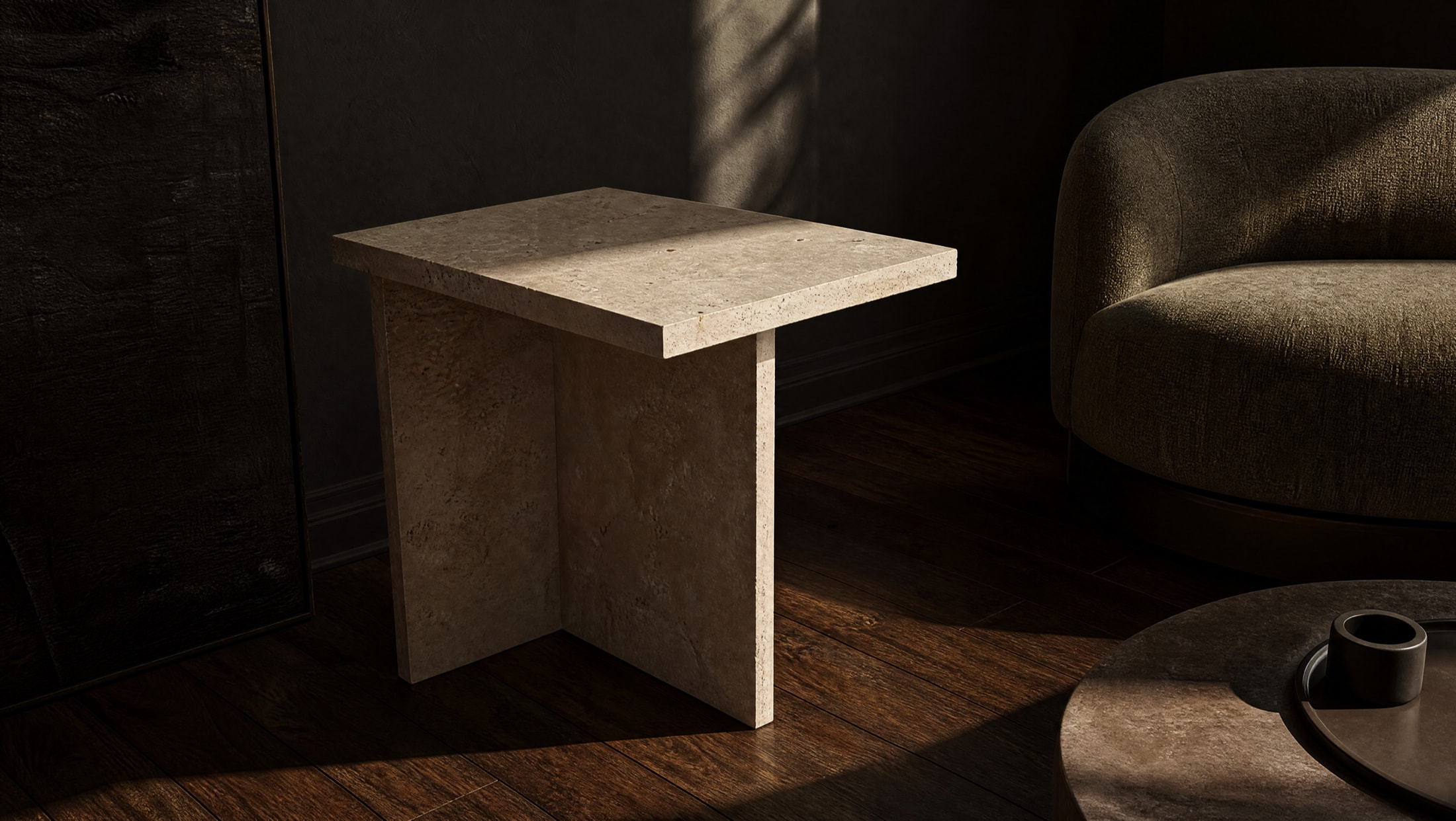 Low light brutalist side table study in natural stone