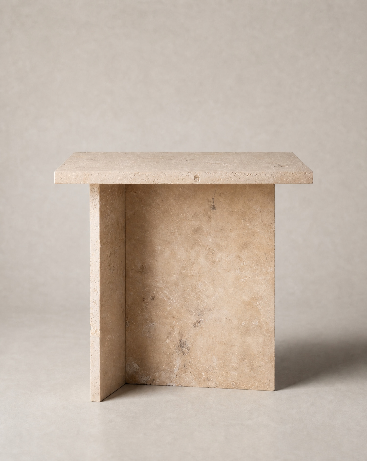 Lunè Pedestal travertine side table and stone nightstand by Atelier Lunè